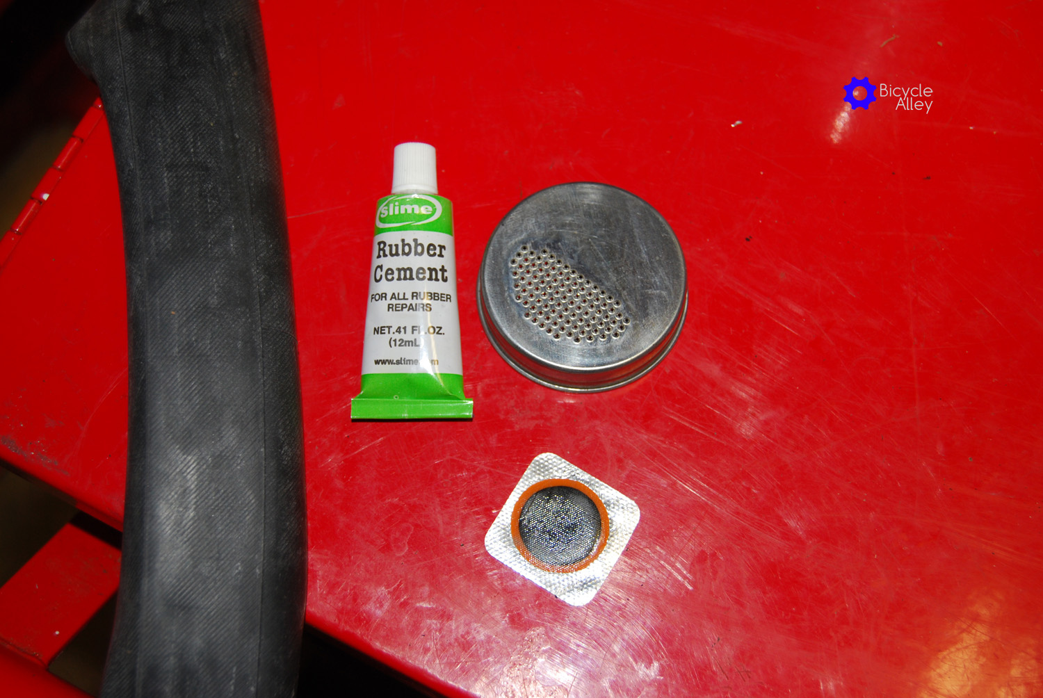 Rubber Cement Scraper and Patch Needed To Repair Punctures