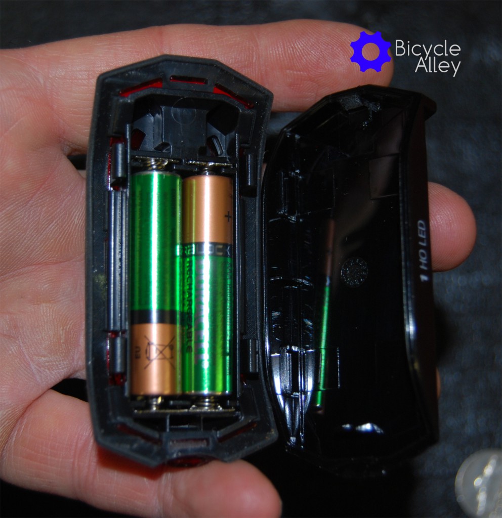 The Bell Arella 100 Tail Light battery compartment with 2 Duracell rechargeable AAA batteries.