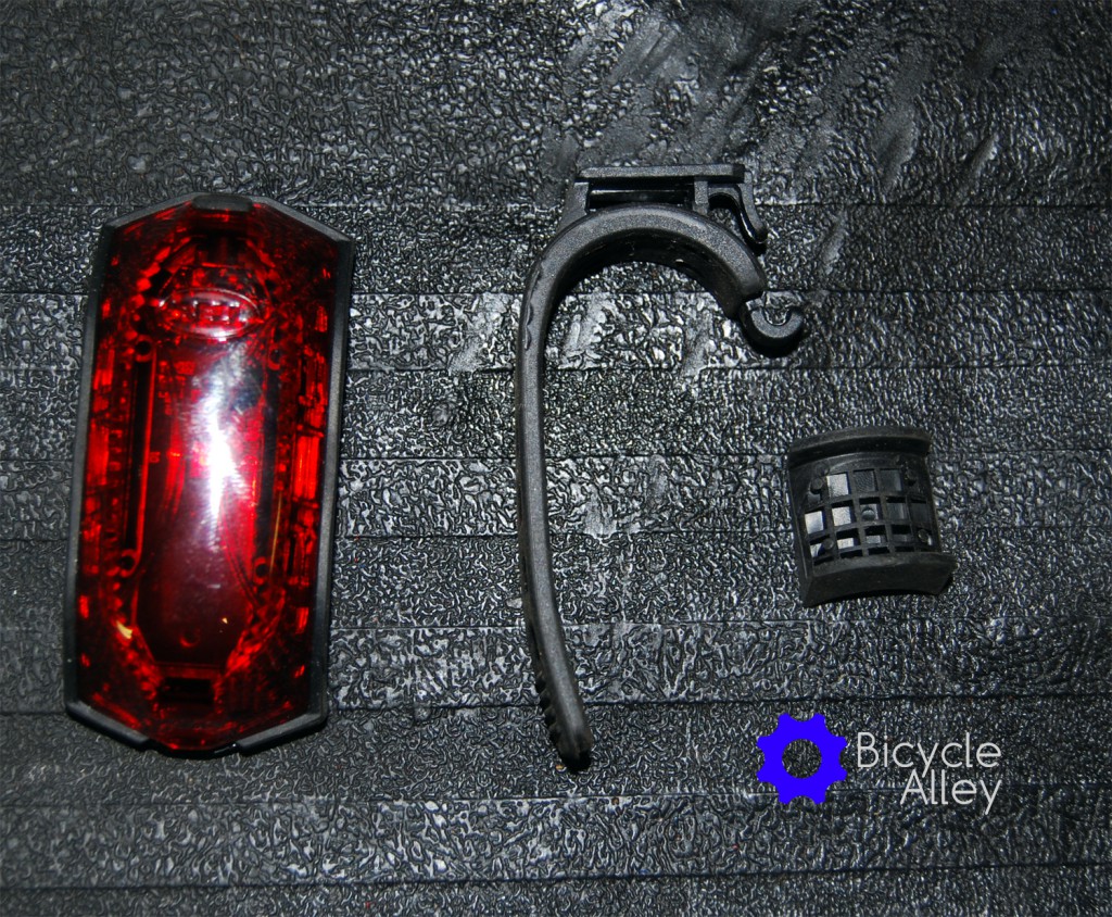 Everything included in the package for the Bell Arella 100 Tail Light. From left to right: Bell Arella 100 Tail Light, silicon mounting strap and shim.