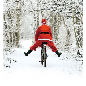 Santa Claus on a new bicycle.