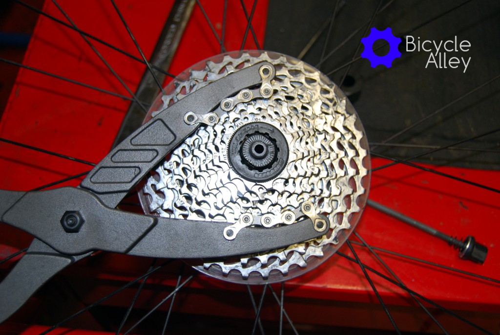 The Park Tool CP-1 Cassette Pliers clamped onto a sprocket on the the cassette.