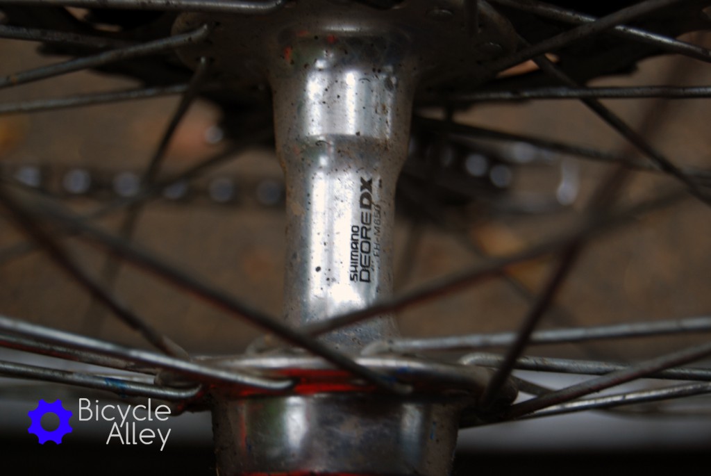 The original Shimano Deore DX rear wheel hub.